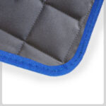 grey quilted Material with blue Cloth Trim