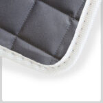 grey Quilted Material with white Cloth Trim
