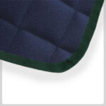 navy quilted Material with green Cloth Trim